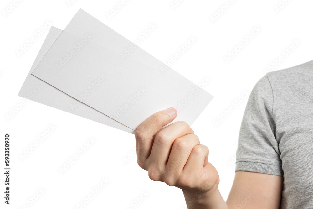 Male hand holding two blank sheets of paper (tickets, flyers, invitations, coupons, banknotes, etc.), cut out Male hand holding two blank sheets of paper (tickets, flyers, invitations, coupons, banknotes, etc.), cut out