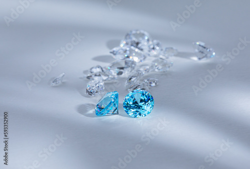 Close up of coloured polished gemstones on light background. High quality photo