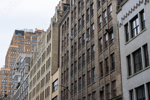 Row of Old Brick Skyscrapers and Buildings in Chelsea of New York City