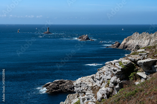 Spectacular Cliffs And Lighthouse At Peninsula Pointe Du Raz At The Finistere Atlantic Coast In Brittany, France