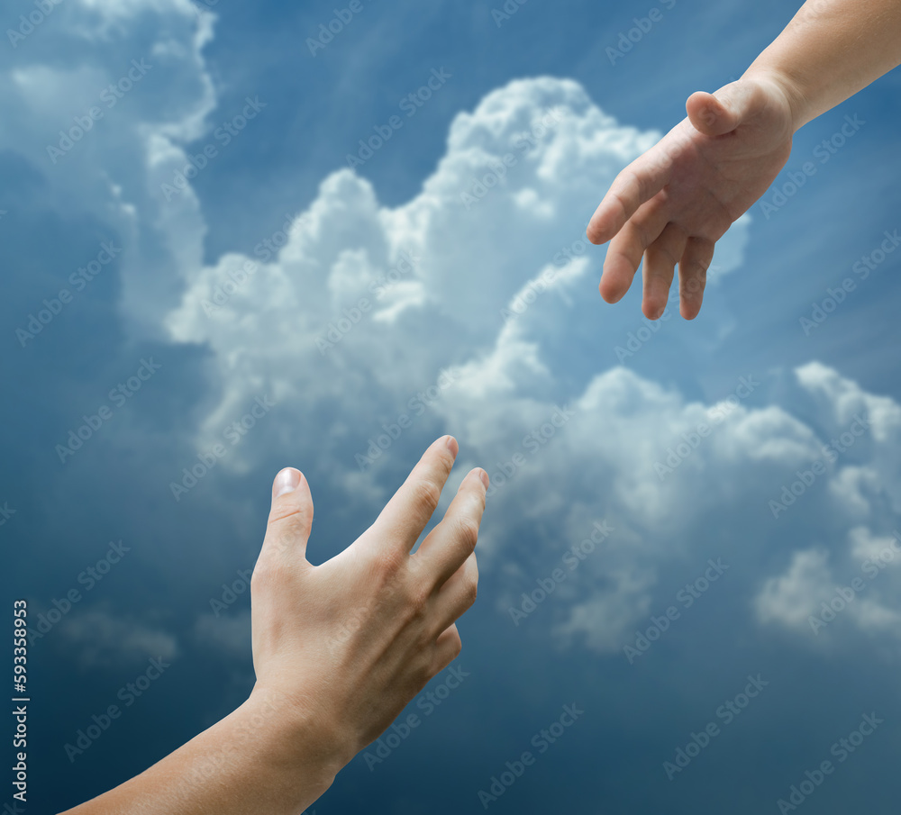 Helping hand with the sky background. Concept on the theme of help, support, religion, partnership.