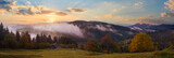 Misty early daybreak panorama in autumn Carpathian mountain, Ukraine.