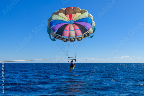 Young woman parasailing at the Red sea, Egypt