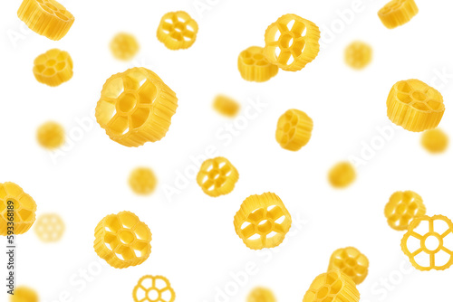 Falling raw Rotelle, uncooked Italian Pasta, isolated on white background, selective focus photo