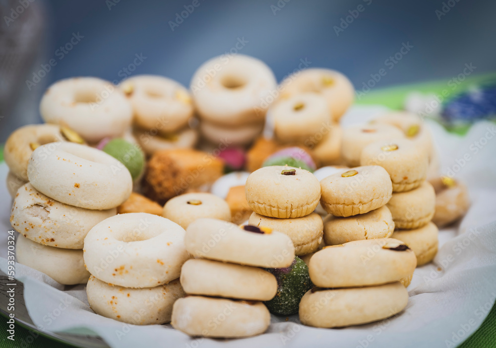 An assortment of traditional Turkish sweets, showcasing vibrant colors and a variety of textures, tempting to the palate. An assortment of traditional Turkish sweets, showcasing vibrant colors and a variety of textures, tempting to the palate.