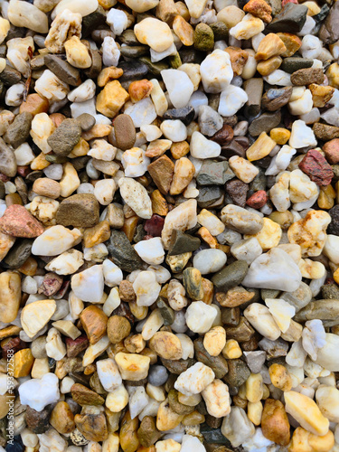 Decorative stones for the garden in shades of beige and brown.