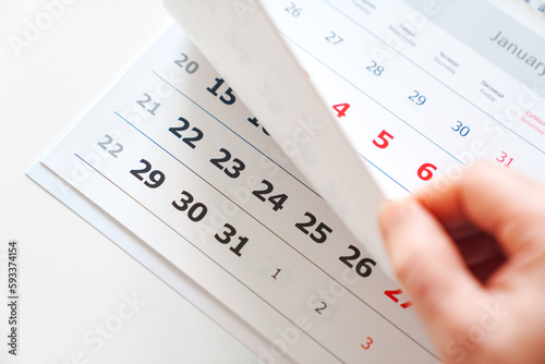 Canvas Print flipping through the pages of the flip calendar.