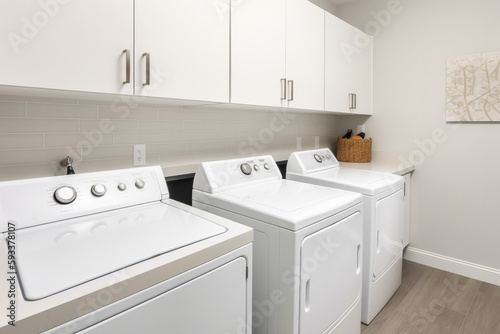 Laundry room with top loading washers in a modern style, minimalist design, white walls, copy space. High quality generative ai
