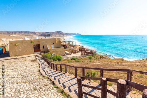 A waterfront cafe along Mughsail Beach near the Dhofar Caves along the Arabian Sea at Salalah  Oman.