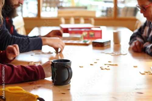 Family board game night at the cabin.