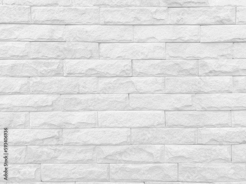 Seamless texture of white stone wall a rough surface, with space for text, for a background..