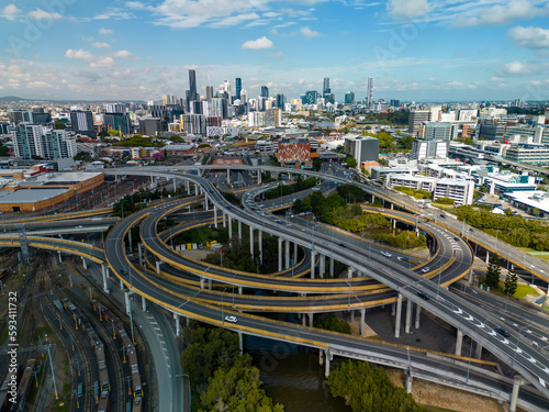 Aerial shot of Brisbane city and highway traffic in Australia in daytime