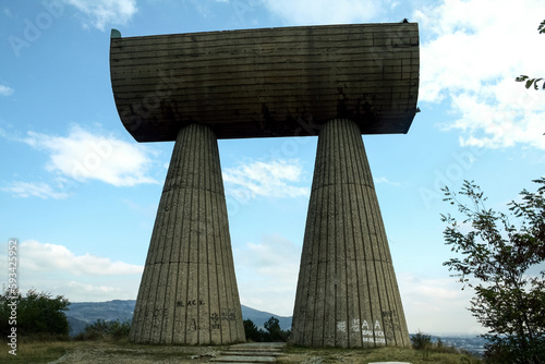 MITROVICA, KOSOVO - OCTOBER 17, 2009: Selective blur on the Miners Monument of Kosovska Mitrovica. Also called monument to heroes of national war, it is a yugoslav landmark of Mitrovice, Kosovo. photo