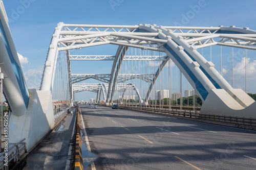 Dong Tru bridge against blue sky in Hanoi, Vietnam © Hanoi Photography