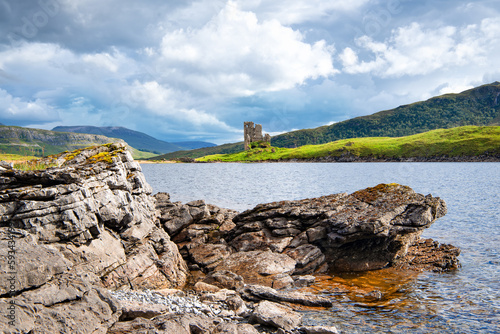 View to Ardvreck Castle, a ruinous old stronghold of the MacLeods of Assynt, in a beautiful spot on the banks of Loch Assynt. photo