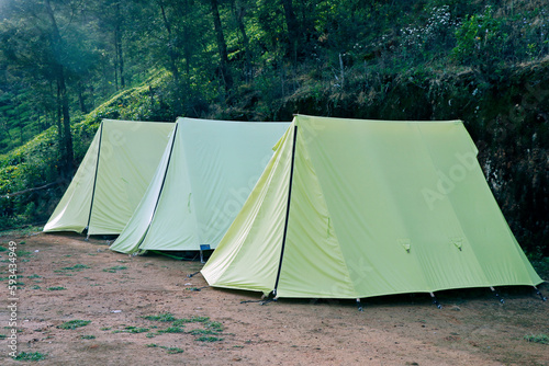camping tents in mountain valley in kerala india © libin