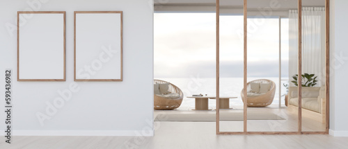 Fototapeta Naklejka Na Ścianę i Meble -  Beautiful white and minimal living room with blank empty frames mockup on white wall