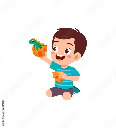 little kid play with dinosaur toy and feel happy