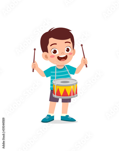 little kid playing one drum and feel happy