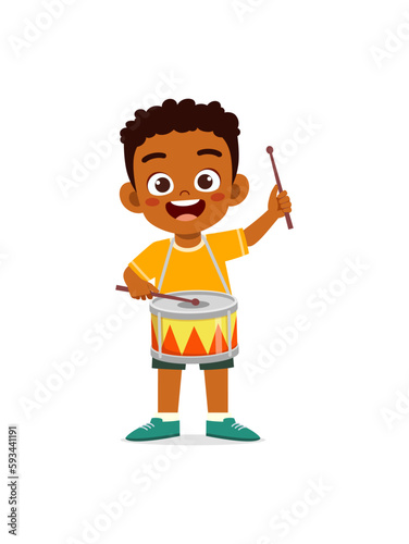little kid playing one drum and feel happy