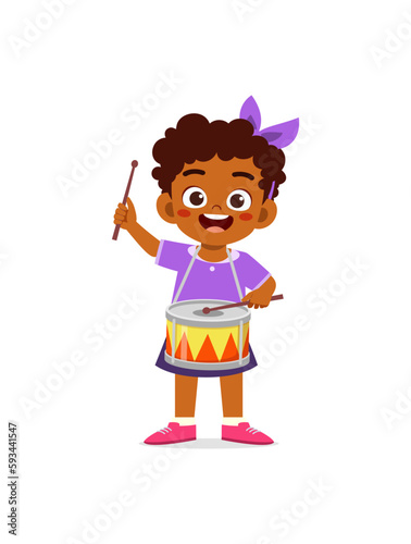 little kid playing one drum and feel happy