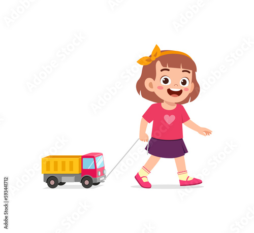 little kid playing a toy truck and feel happy