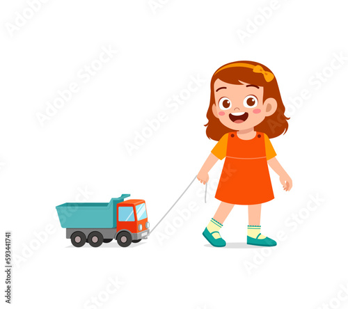 little kid playing a toy truck and feel happy