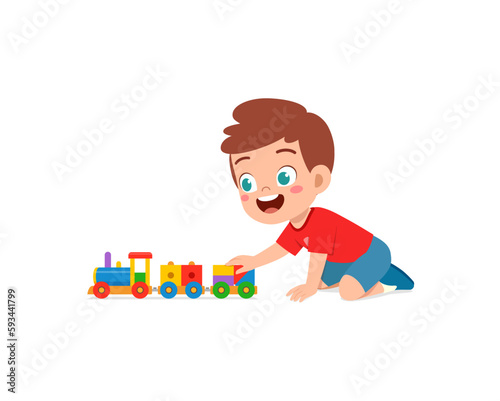 little kid playing toy train made from plastic and feel happy