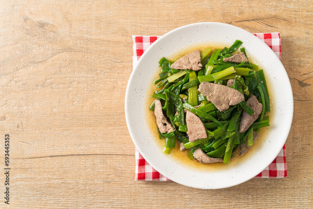 Stir-fried onion flower stem with pork liver Stir-fried onion flower stem with pork liver