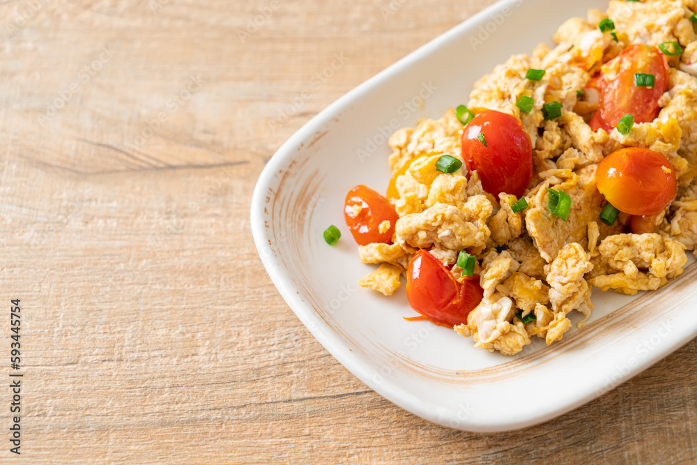 stir-fried tomatoes with egg on plate stir-fried tomatoes with egg on plate
