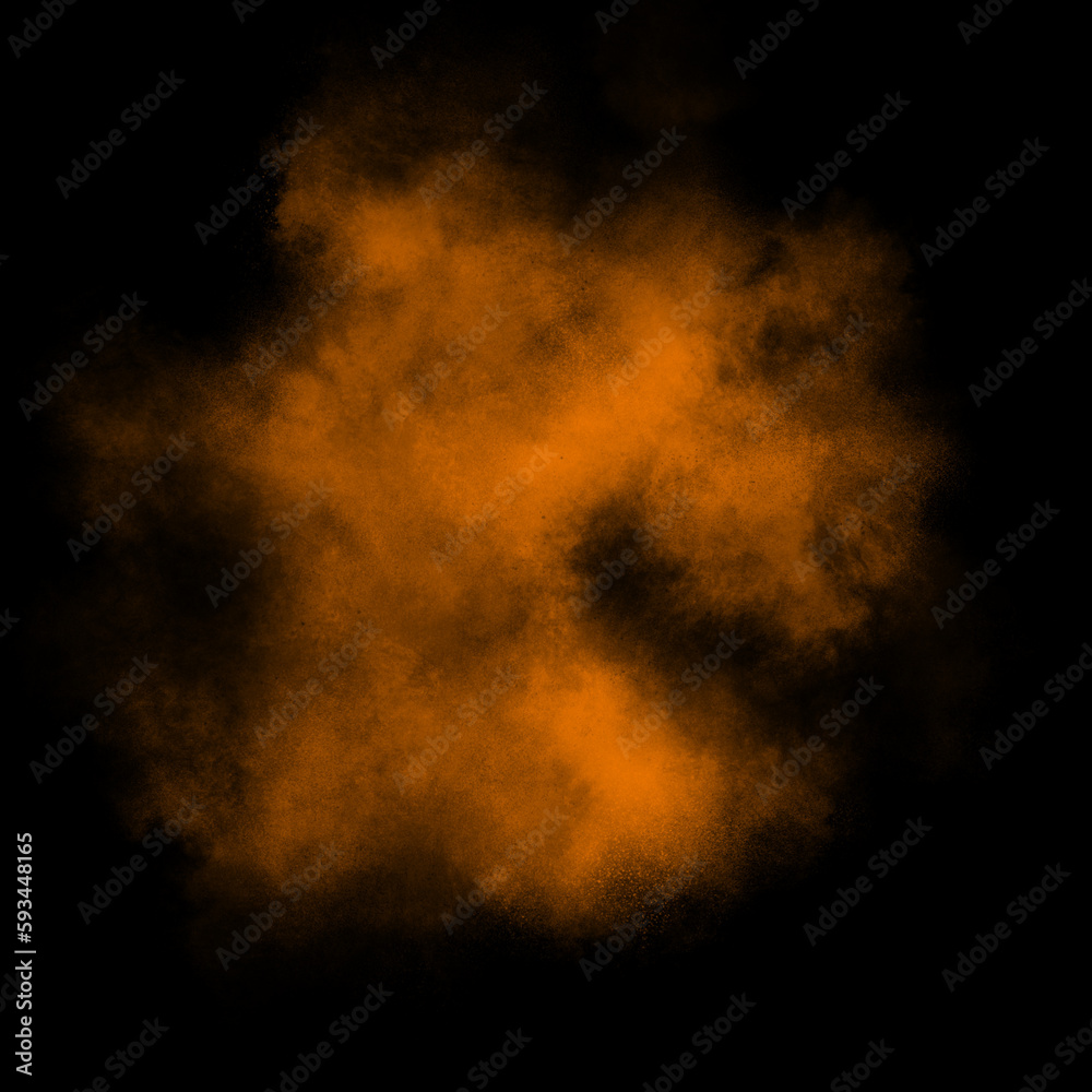Orange color powder explosion isolated on black background. Royalty