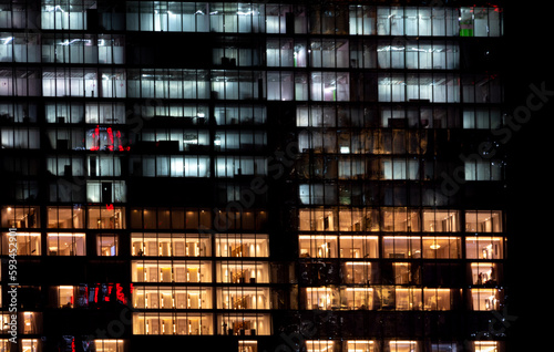 Illuminated windows at night in downtown SIngapore