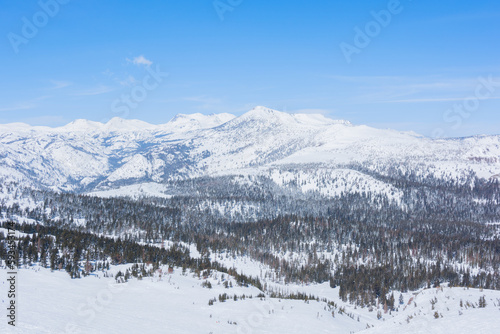 A view of snowy mountains on Mammoth Mountain in Mammoth Lakes, CA © Christopher