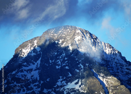 Rocky mountain peak Piz Linard (3410 m) in the massif of the Silvretta Alps above the road pass Fluela (Flüelapass), Zernez - Canton of Grisons, Switzerland (Kanton Graubünden, Schweiz) photo