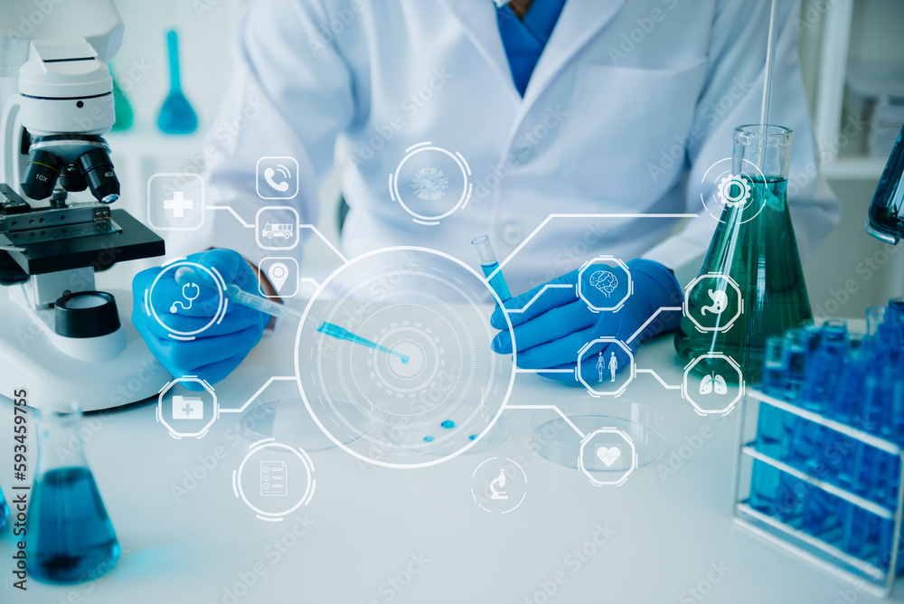 DNA molecule testing concepts. The doctor in a mask examines DNA molecules on the chemical laboratory with VR icon. DNA molecule testing concepts. The doctor in a mask examines DNA molecules on the chemical laboratory with VR icon.