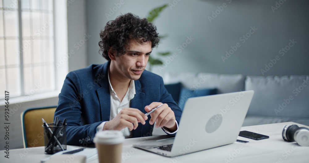Asian human resources manager having an online interview via teleconference. Businessman talking with customers in video chat from home office Asian human resources manager having an online interview via teleconference. Businessman talking with customers in video chat from home office