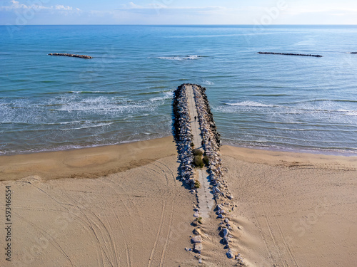 Obraz na płótnie Lanscape aerial view, Italy Pescara. Empty beach, waves, sea, coast, sand, rocks. w salonie