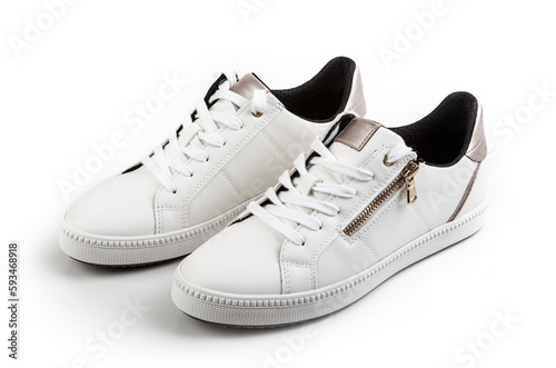 Pair of white sneakers isolated on white background with clipping path.
