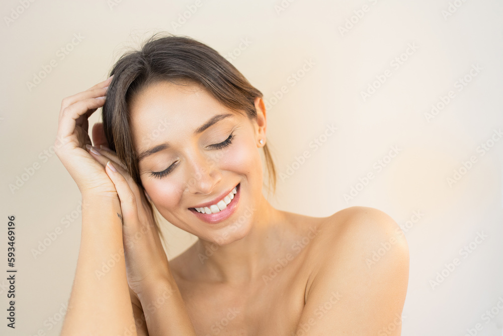 Happy Young Woman With Glowy Skin Eyes Closed Touching her Face with Flawless Healthy and Bright No-Makeup Makeup Look Happy Young Woman With Glowy Skin Eyes Closed Touching her Face with Flawless Healthy and Bright No-Makeup Makeup Look