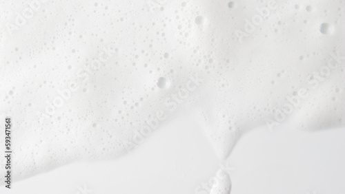 Abstract background white soapy foam texture. Shampoo foam with bubbles