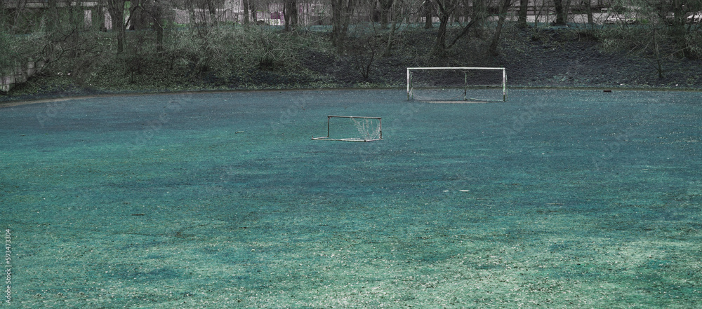 Obraz premium Abandoned football field in rustic area