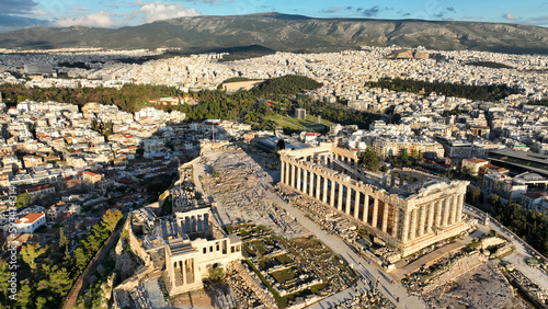 Aerial drone dramatic shot above unique Acropolis hill and the Parthenon an Unesco world heritage site, Athens historic centre, Attica, Greece