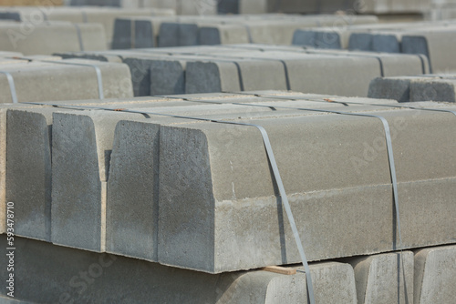 Fotografie concrete curbstones road laid tied on a pallet