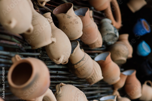 Ceramic clay terracotta jug, pot, vase, kitchen souvenirs in a handmade ceramics street store.