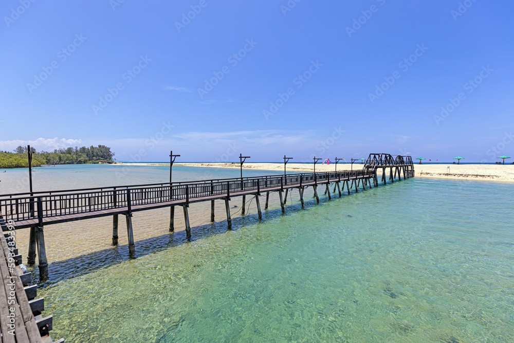 Panoramic picture along wooden bridge over Bo Dan River at Natai Beach in Thailand