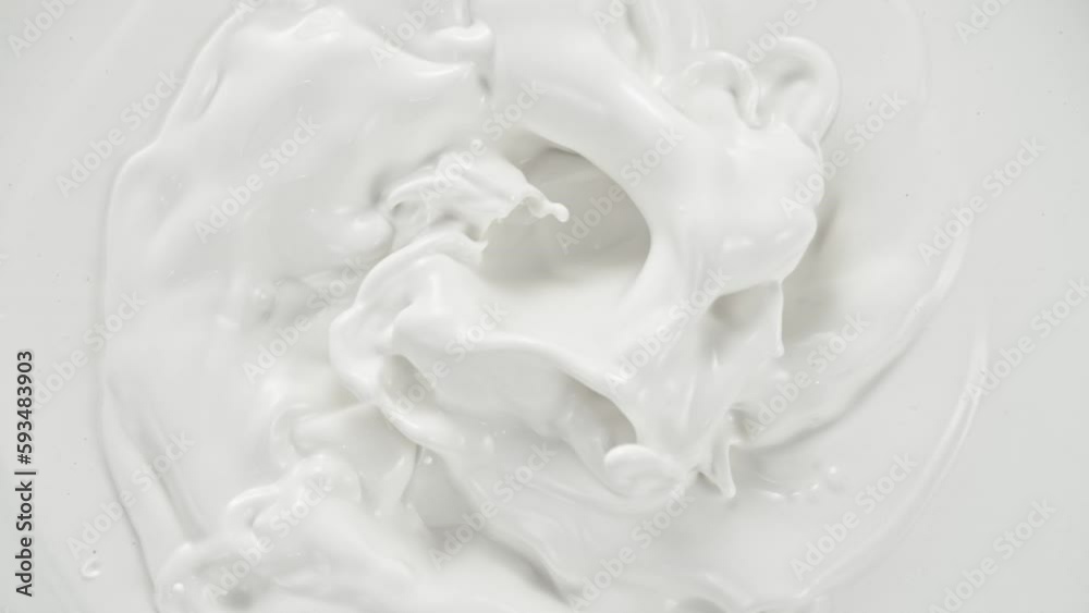 Super Slow Motion Shot of Swirling Fresh Milk at 1000fps.