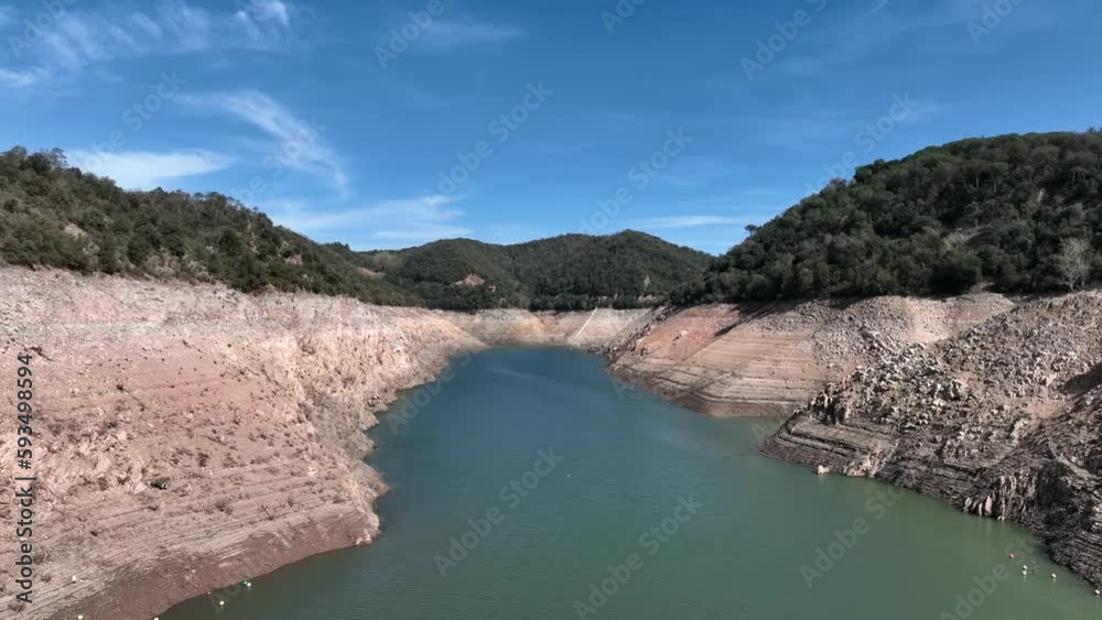 Drying water reservoir during heat waves in Spain, aerial drone view Drying water reservoir during heat waves in Spain, aerial drone view