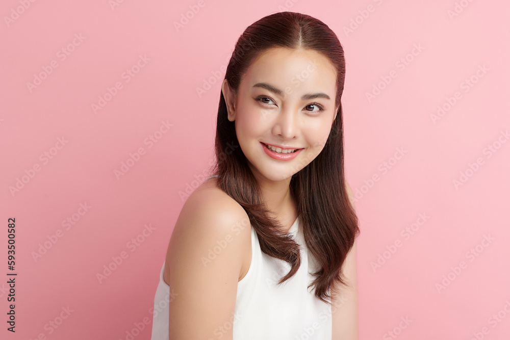 Beautiful young asian woman with clean fresh skin on pink background, Face care, Facial treatment, Cosmetology, beauty and spa, Asian women portrait.