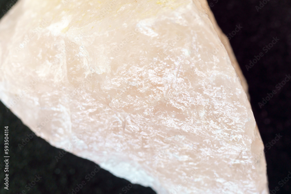 Rose quartz, stone silicate mineral. Rough, uncut, pinkish color. Close up macro Rose quartz, stone silicate mineral. Rough, uncut, pinkish color. Close up macro