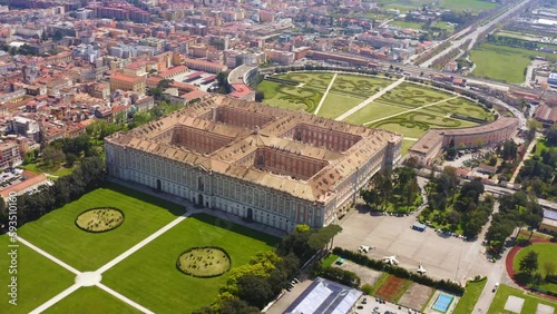 Aerial view of the Royal Palace of Caserta also known as Reggia di Caserta. It is a former royal residence in Caserta, near Naples, Italy. It is the the royal garden of the building. photo